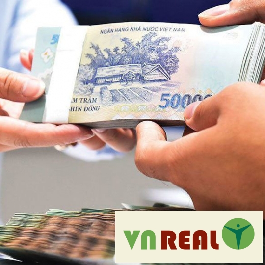 Hàng xóm đòi 100 triệu đồng mới ký giáp ranh đất, tôi phải làm gì?